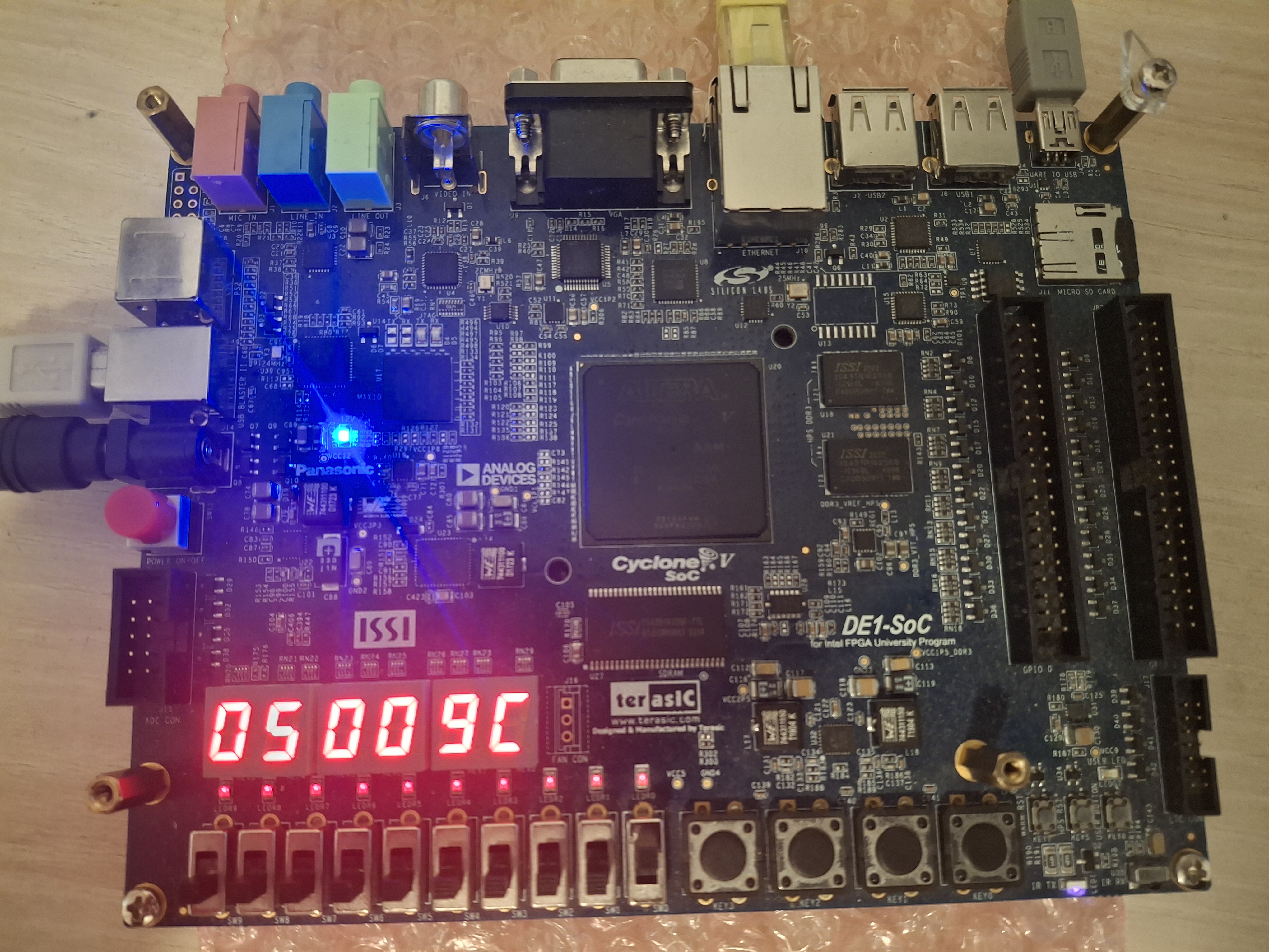 Hardware validation on Intel FPGA: test program running with real-time output on 7-segment displays